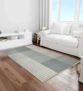 Machine washable gradient rug in silver and charcoal tones.